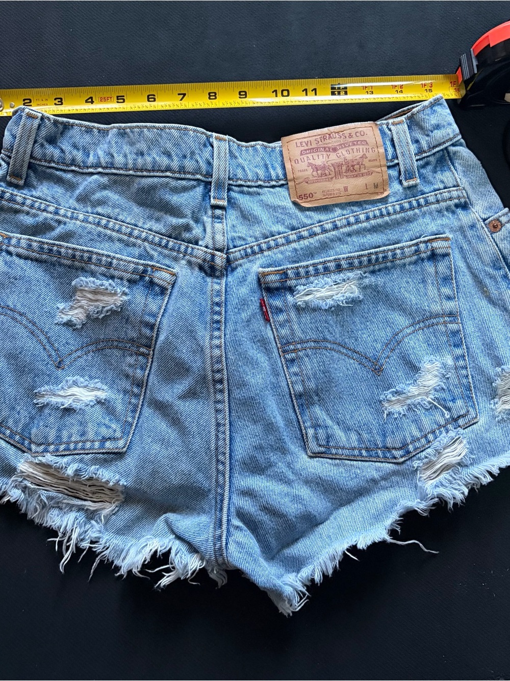 Levi's Light Blue Distressed Denim Shorts